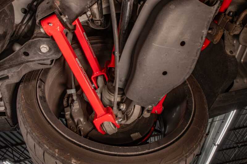 UMI Performance 16-24 Chevrolet Camaro Suspension Trailing Arm - Red